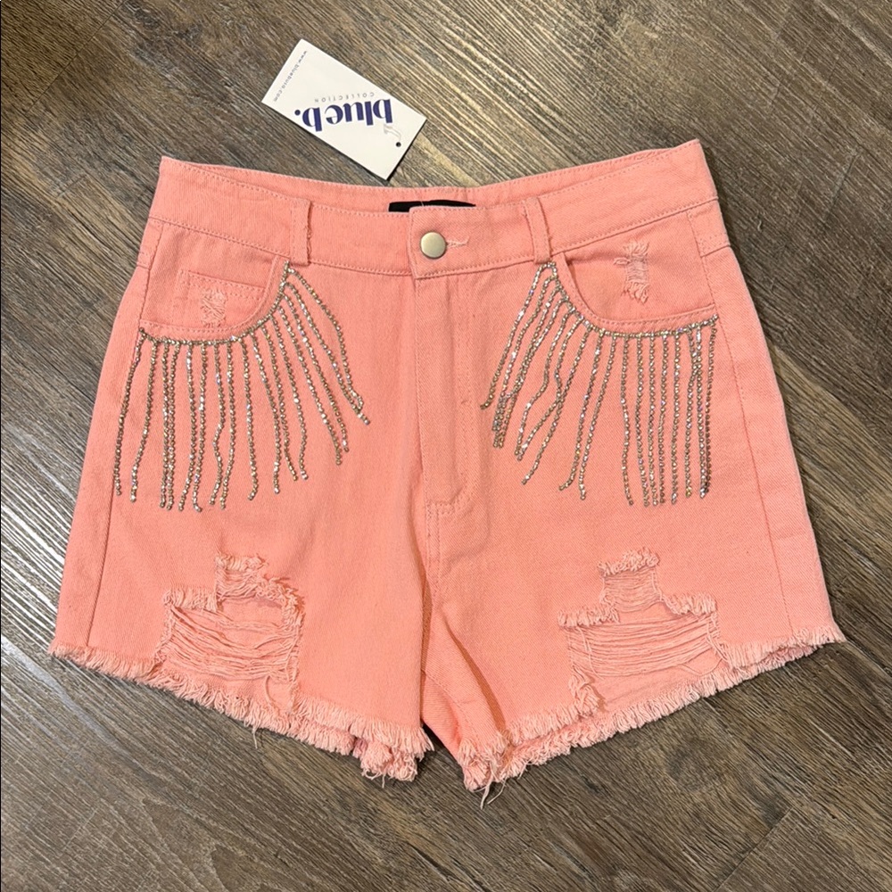 High-Waisted Pink Jean Shorts with Frayed Hem